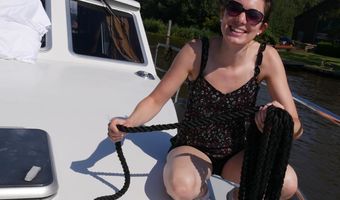 Voorbereiding voor het afmeren met het touw in de hand