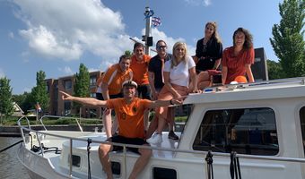 Gezellig aan dek poseren voor een foto, de gezelligheid straalt er vanaf