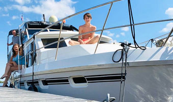 Pa, ma en zoon samen op dek